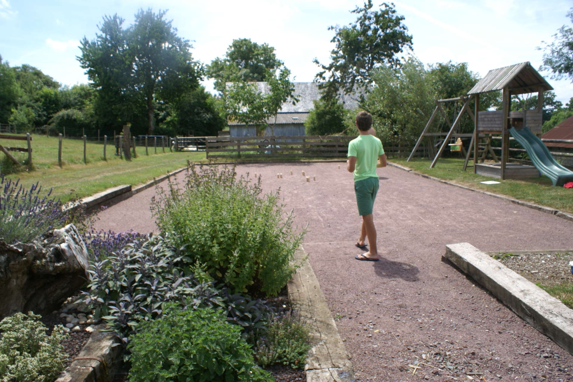 Play area at Eco-GItes of Lenault, a holiday home in Normandy, France