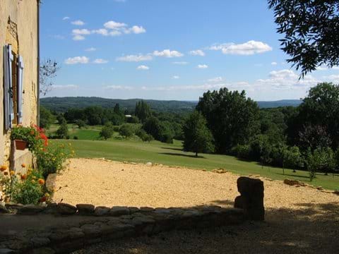 the side terrace of the gite with views over the Dordogne