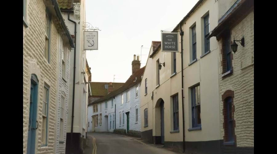 Blakeney High Street - Benbow Cottage is the white house on the right