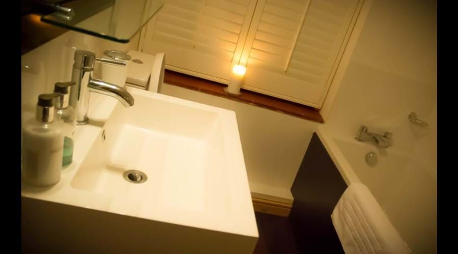 Main bathroom with bath and walk in shower