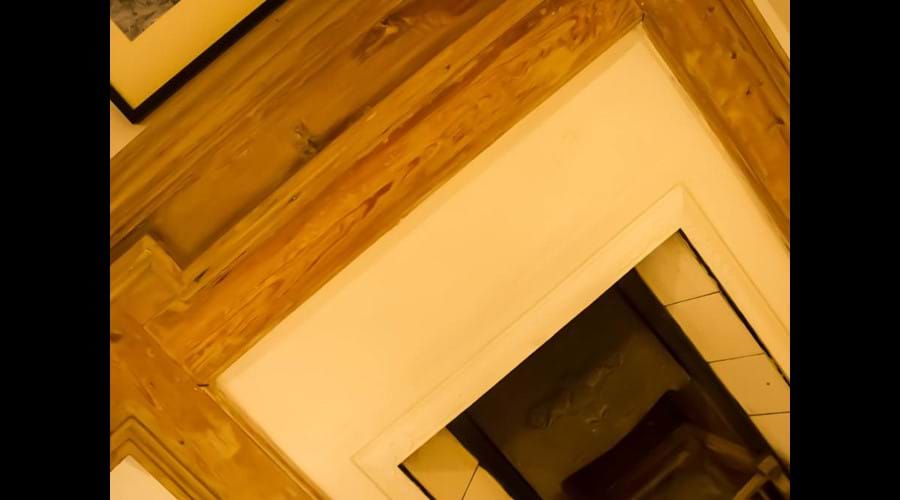 Original fireplace detail in the master bedroom