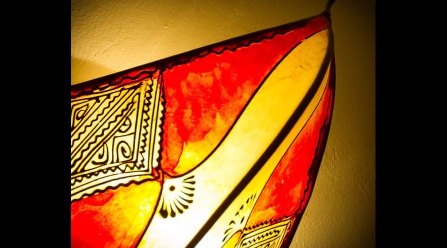North African wall lighting throughout for an intimate glow