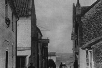 The Ship Inn looking down to The Quay (now Benbow Cottage)