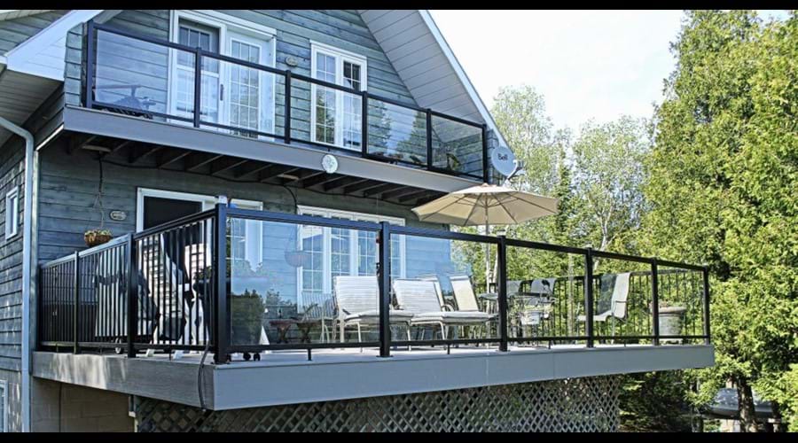 The large elevated deck at the front of the cottage was completely updated during the spring of 2014. It now has PVC decking and aluminum and glass railings. 