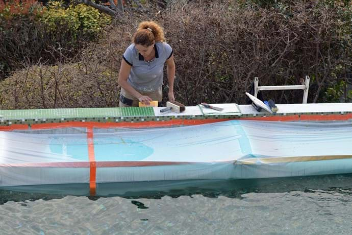 March 2021 - With a remarkable eye for detail, Teresa, our mason, uses a rental free week to meticulously lay new tiles on the Infinity Edge of the Pool.  This lady really understands precision!