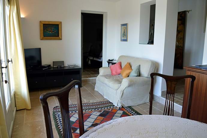October 2015 - New layout of Pool Level Living Area with dining table and chairs, sofa, satellite TV, DVD Player & portable Bose Blue Tooth Player.