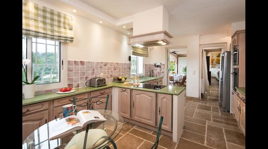 Fully Equipped Kitchen opens to Terraces at Mid Level