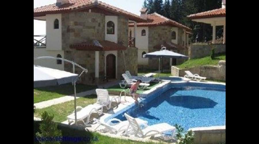 sun loungers, pool & jacuzzi at our group friendly chalet accommodation