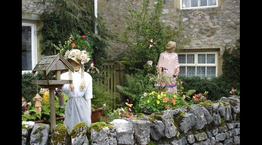 Scarecrow display in local garden