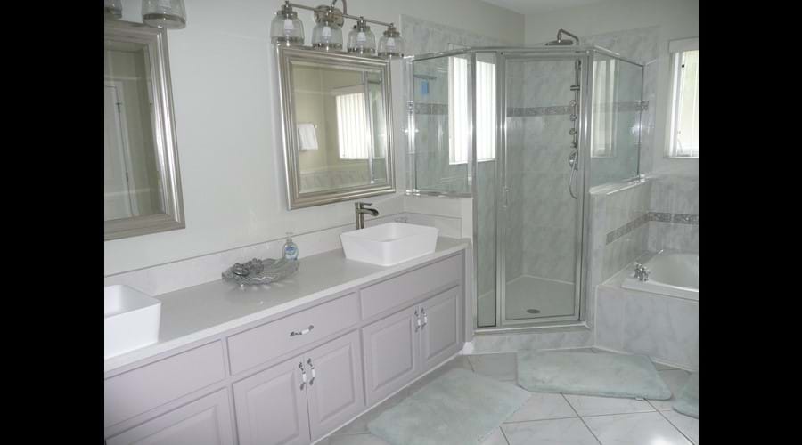 Upstairs master bathroom recently remodelled with vessel sinks