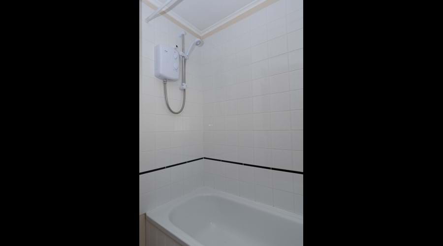 Electric shower over bath