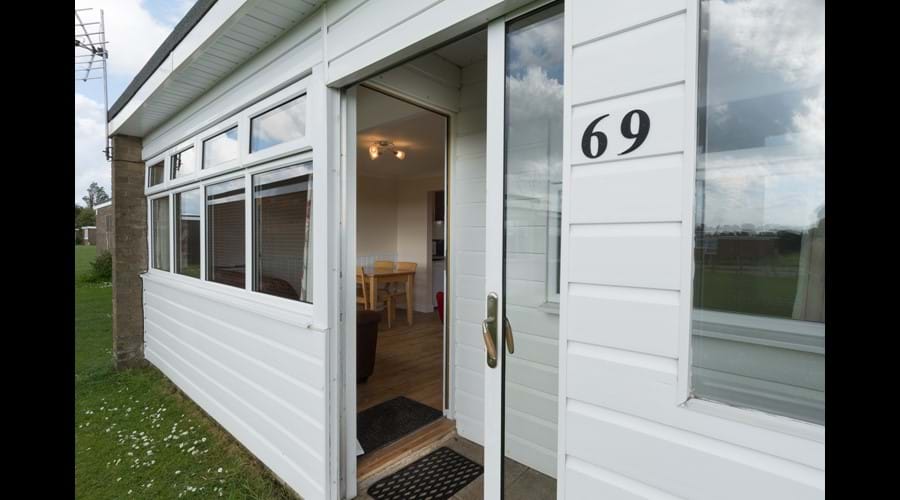 Front of chalet with enclosed porch area