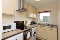 Fully equipped modern kitchen with washing machine