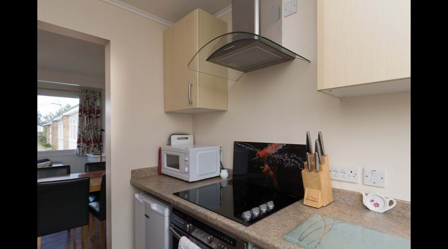 Fully equipped modern kitchen with washing machine