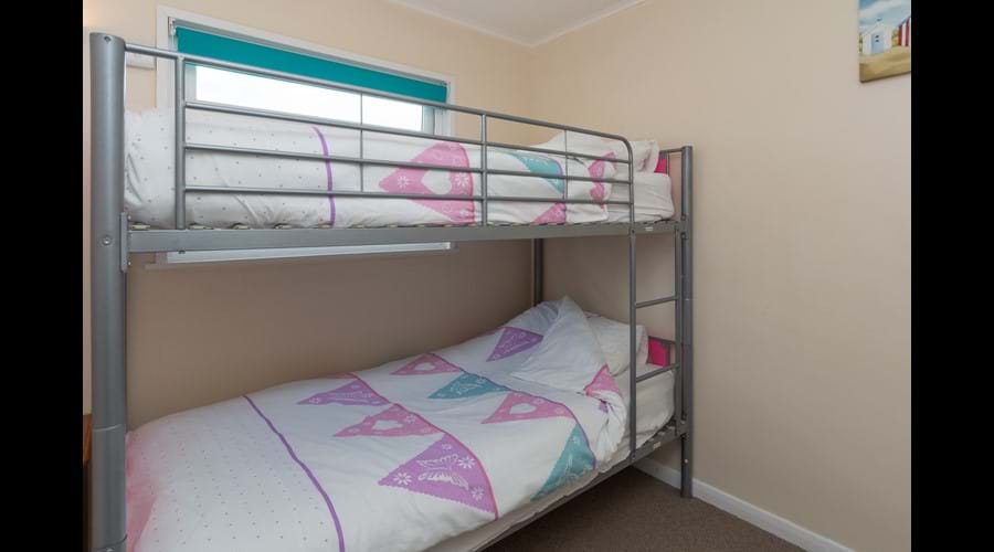 Second bedroom with space for cot or ready bed with fitted wardrobe