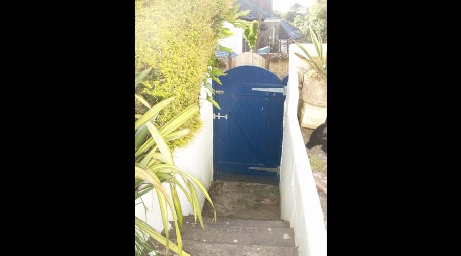 steps in garden leading to back gate