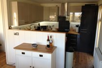 Comprehensively Equipped Open-Plan Kitchen