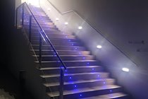 Lights lead the way to the upstairs of La Antigua Bar