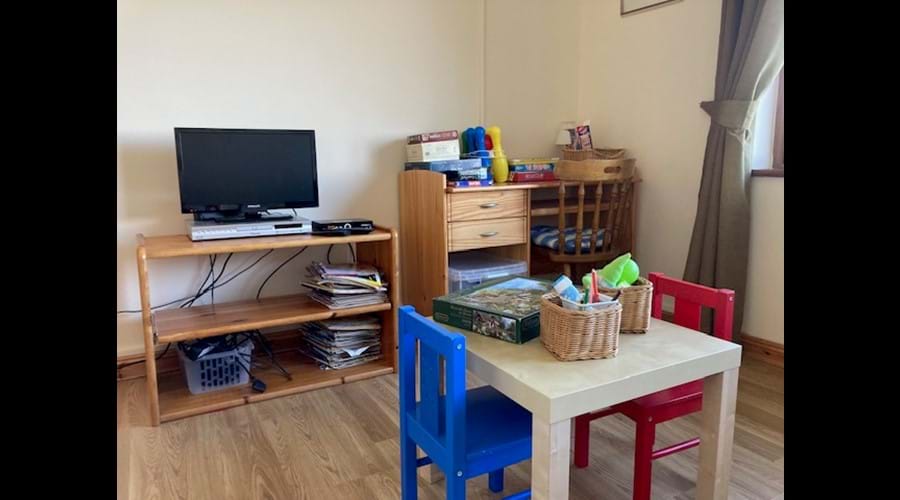 Playroom with TV screen & DVD player Playroom with TV screen & DVD player