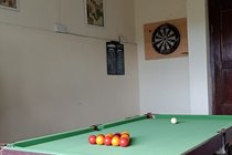 Pooltable and Dartsboard in garage Pooltable and Dartsboard in garage