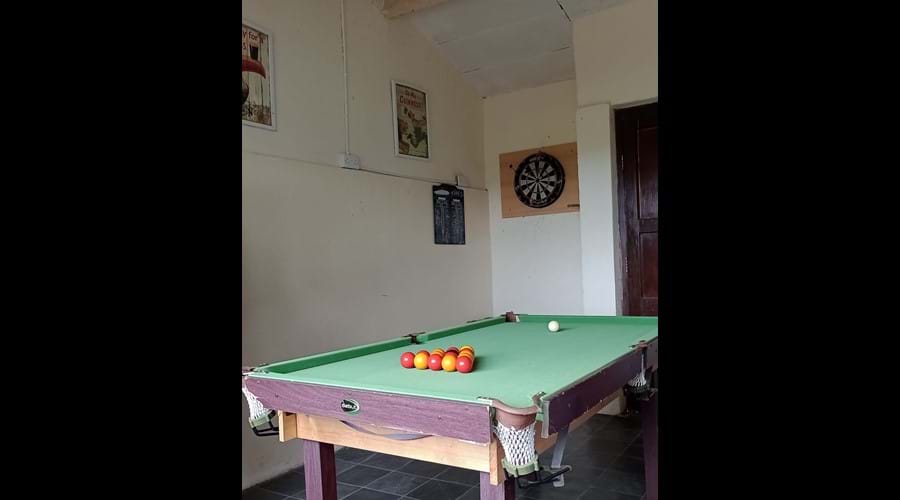 Pooltable and Dartsboard in garage Pooltable and Dartsboard in garage