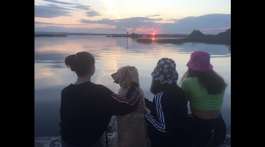 Enjoying the sunset down at the lake