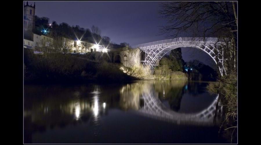 NIGHT TIME VIEW OF THE IRON BRIDGE