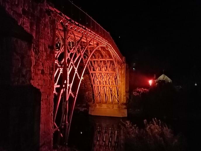 THE IRON BRIDGE LIT UP IN FURNACE COLOUR AT WEEKENDS