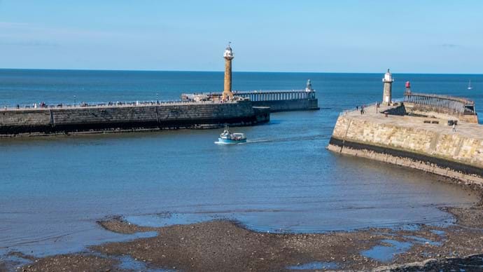 Whitby piers and lighthouse