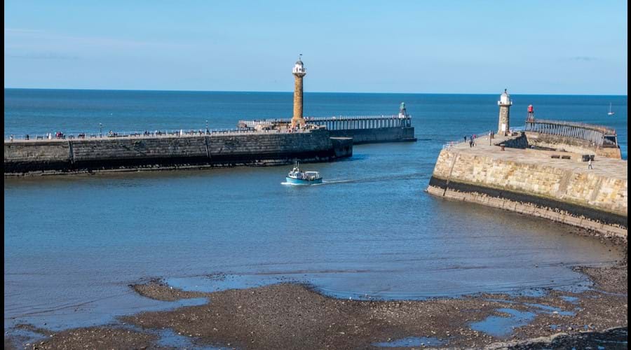 Whitby piers and lighthouse