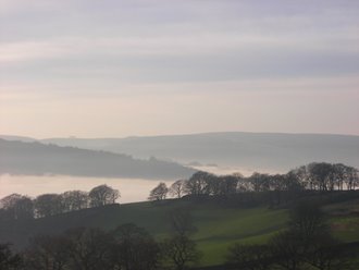 Early morning mist in the valley below