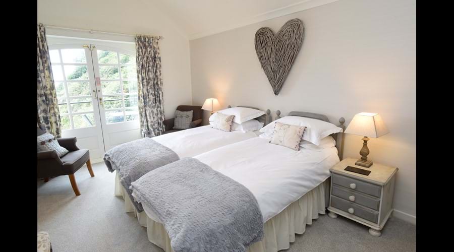 Enfys Bedroom with balcony and views towards the sea