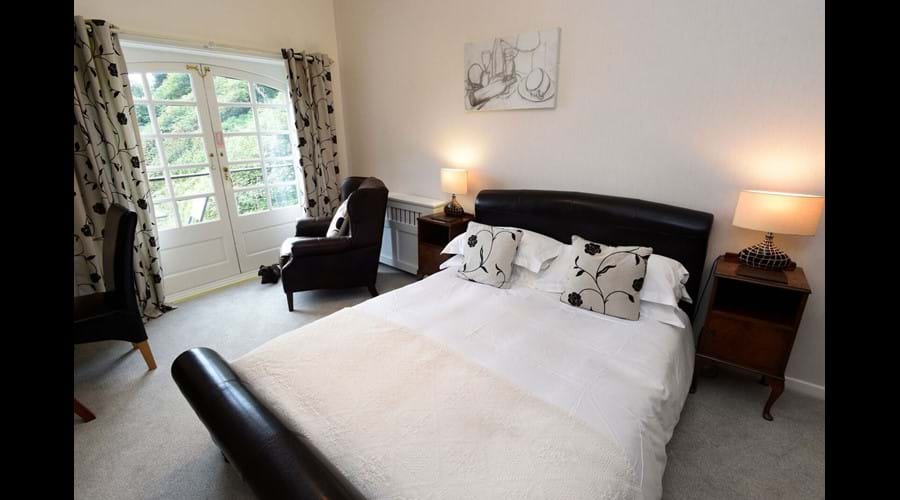 Leather Bedroom with balcony and views towards the sea