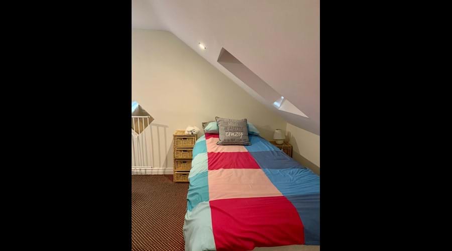 Single bed in your family room.