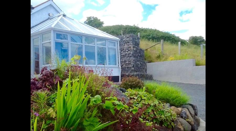 The boat house ballygally The boathouse ballygally right on the coastal route.