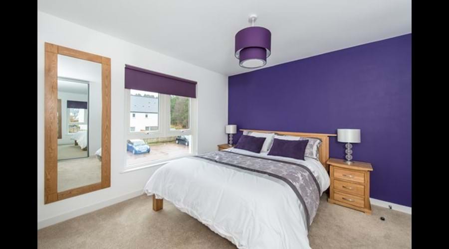 Contemporary and generous king bedroom with ensuite