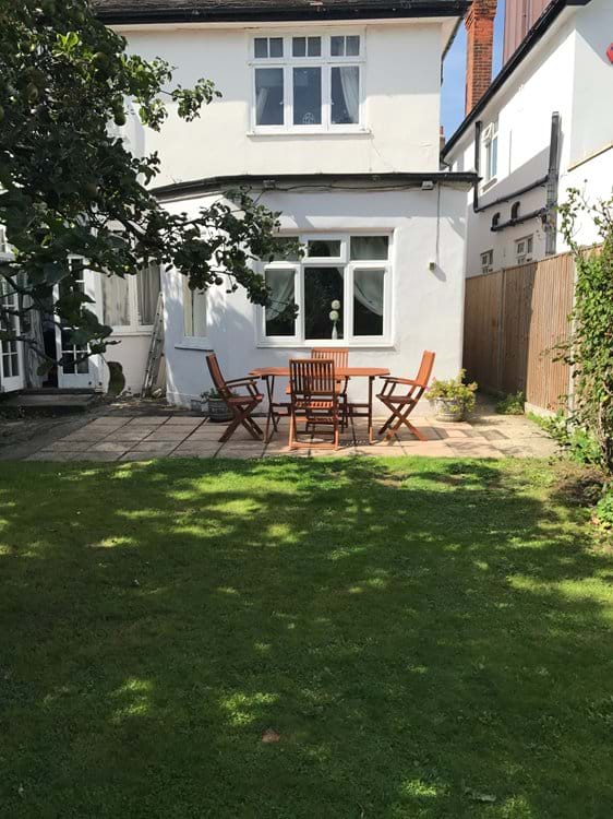 Private garden with patio and garden furniture