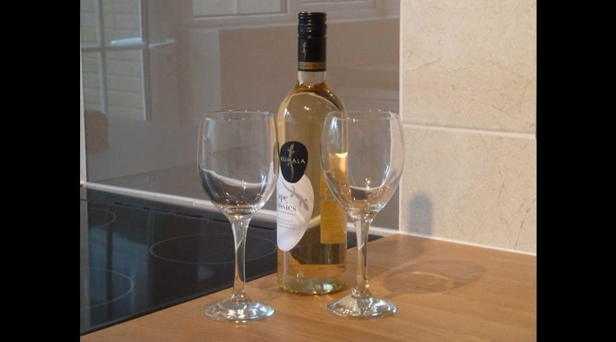 A bottle of chilled white wine awaits your arrival.