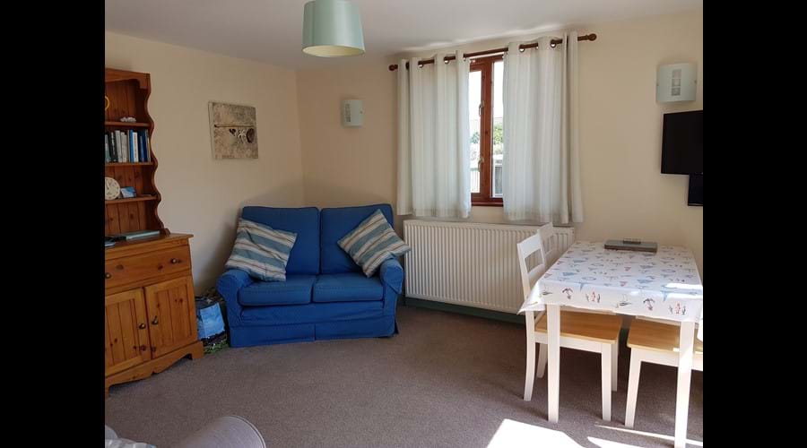 comfortable living room with dining table