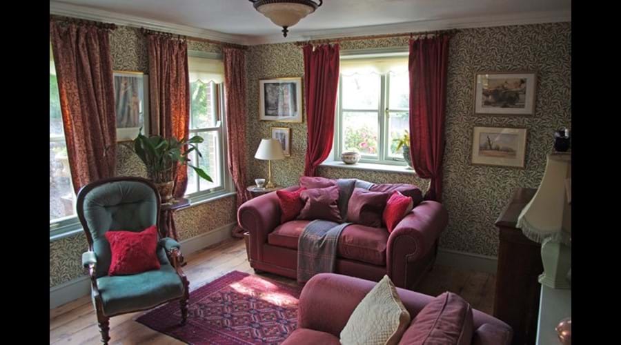 Albion Cottage living room with bed settee