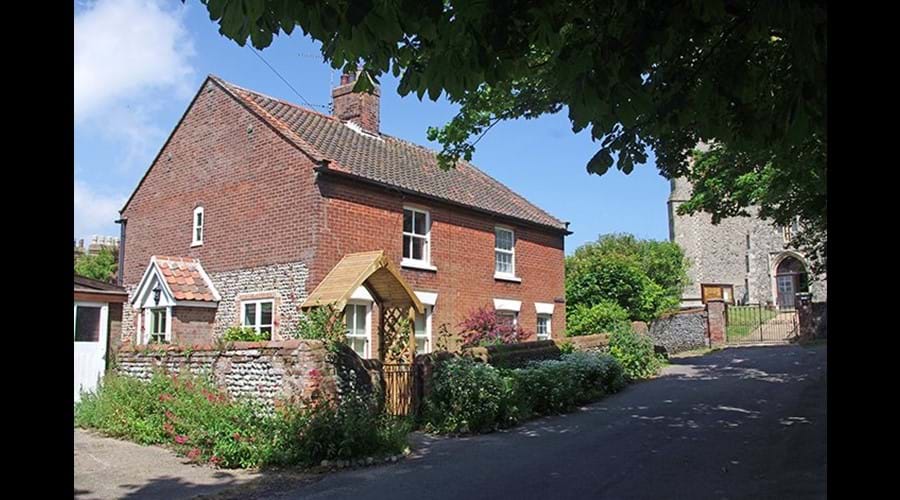 Albion cottage from Church street with a glimpse of the church