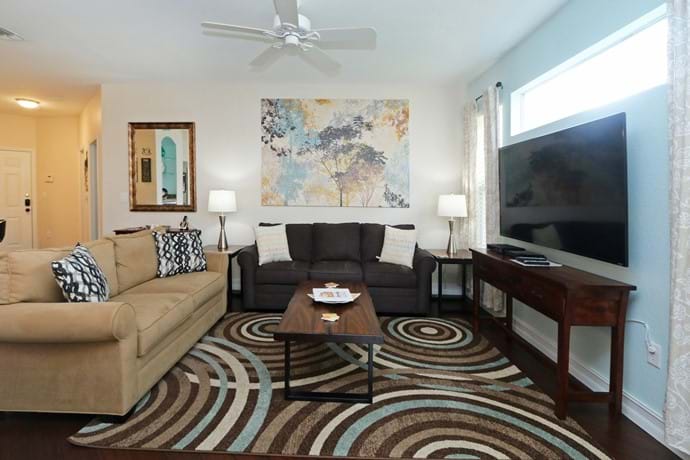 Large, light and airy living area with large 46" TV at our 2 bedroom condo 7-108