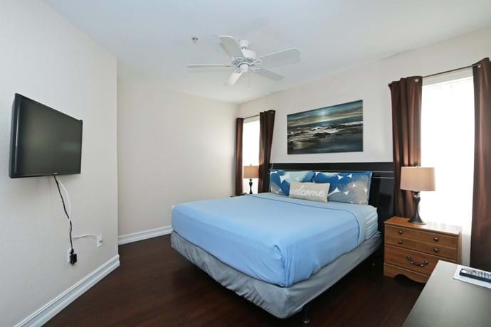 Master Bedroom with King Bed and walk in closet, en-suite bathroom and large TV
