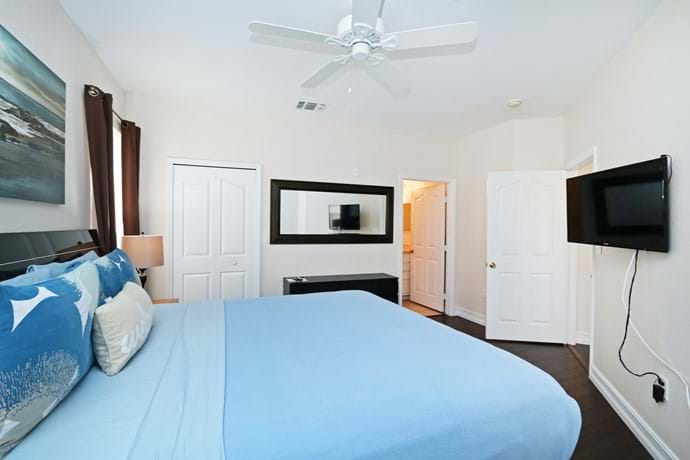 Master Bedroom with King Bed and walk in closet, en-suite bathroom and large TV