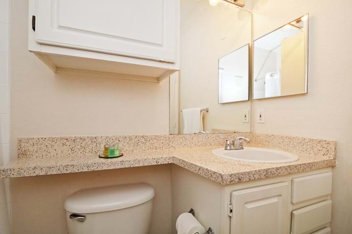 Bathroom with shower over bathtub - access from Bed 2 as well as from hallway