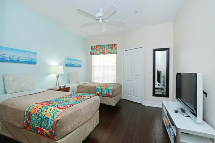 newly refurbished Bedroom 2 at 7-108 with walk in closet, TV, A/C, ceiling fan