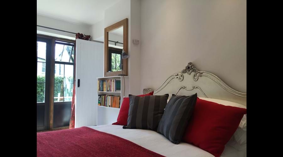 The Shippon bedroom with French windows