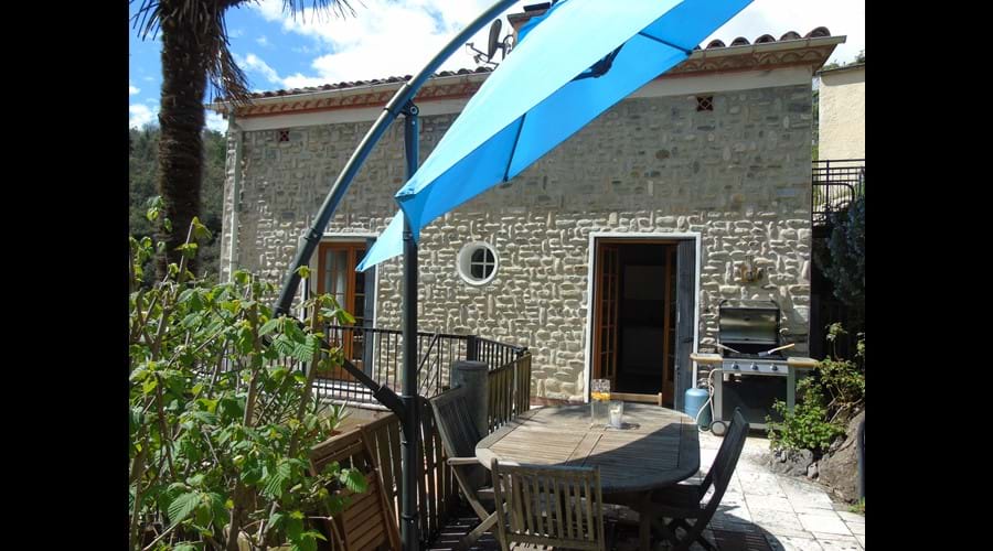 A lovely terrace to enjoy your BBQ and meals in the sun