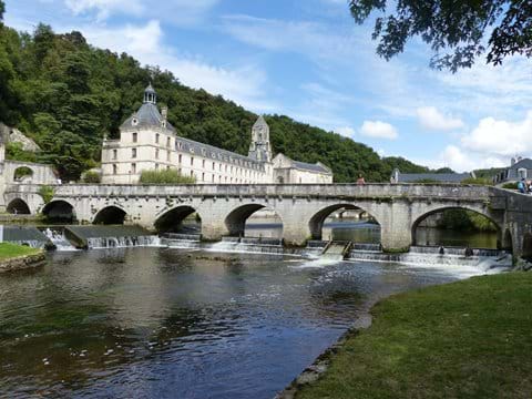 View of the monastery from the river in Brantome
