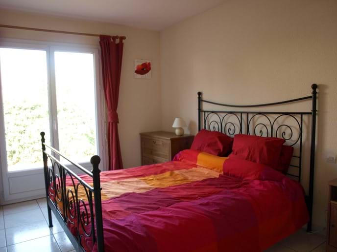 Downstairs double bedroom with French doors to the garden, and a spacious ensuite shower room